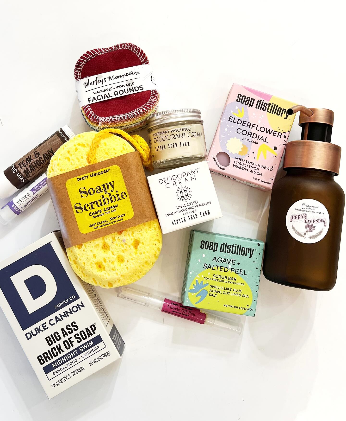 Self-Care Items available at Stumble & Relish, including lavender aromatherapy neck wraps, artisan-made scented bar soaps, and calming candles and fragrances.